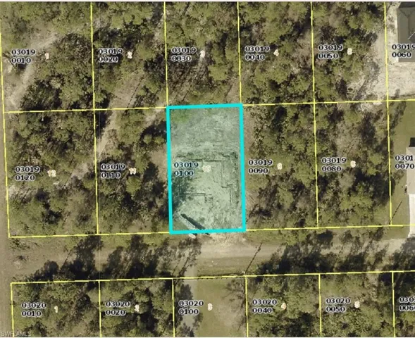 Aerial map of property and surrounding area featuring property parcel outlined