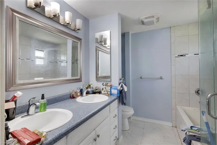 Separate whirlpool tub and shower.