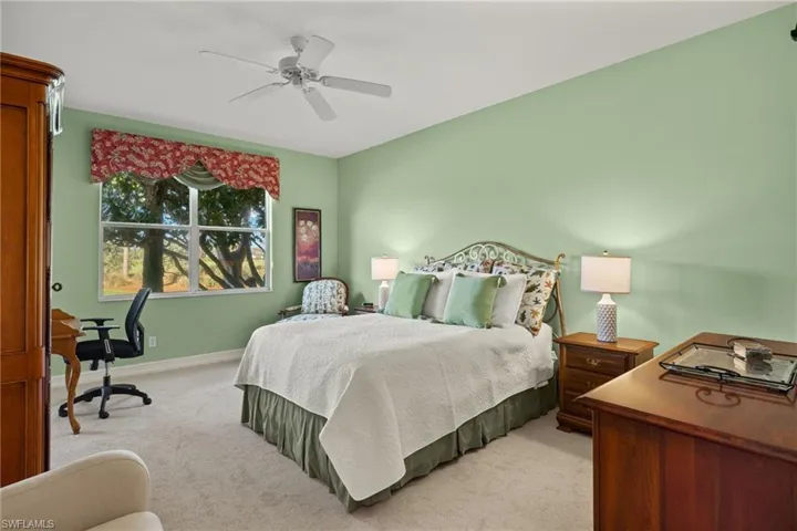 Spacious and airy primary bedroom.