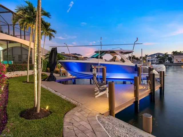 Dock with glass enclosure and boat lift