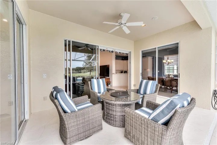 View of patio with ceiling fan