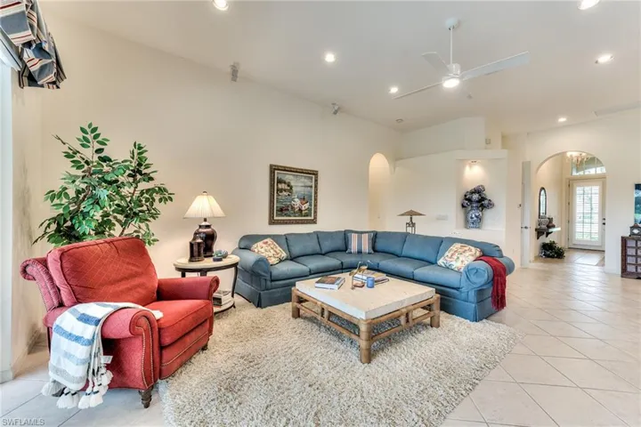 Tiled living room with ceiling fan