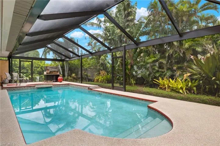 View of pool featuring a lanai and a patio