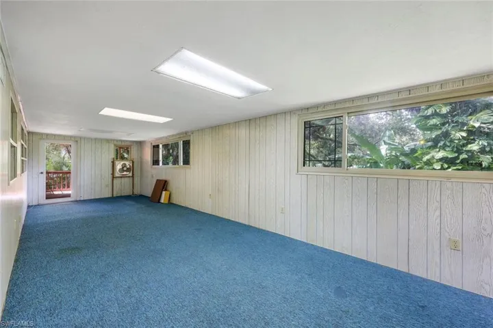 Carpeted Florida Room off of Master Bedroom