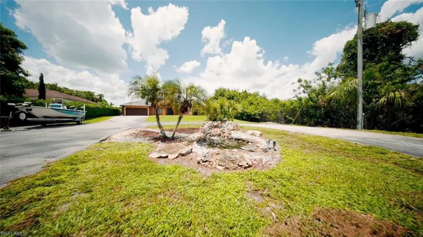 Fish pond, front of lot