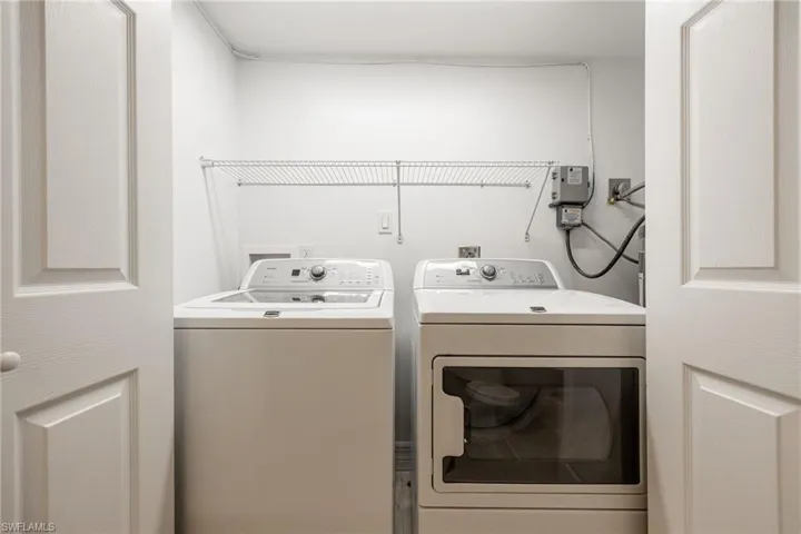 Laundry area featuring washing machine and dryer