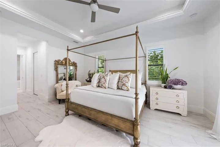 Owner's suite with tray ceiling.