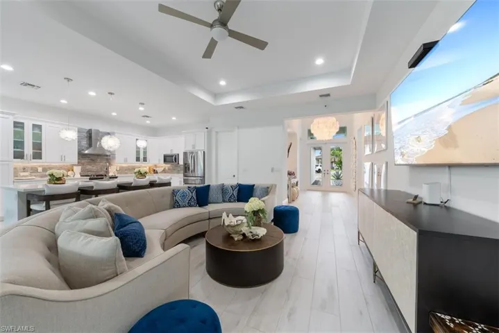 Great room featuring a tray ceiling.