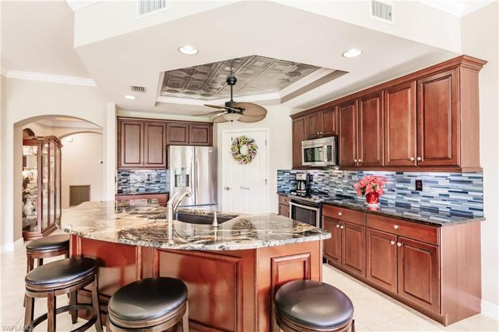 UPDATED KITCHEN WITH PLENTY OF ROOM TO ENTERTAIN FAMILY & FRIENDS! TONS OF CABINETS & COUNTERTOPS!
