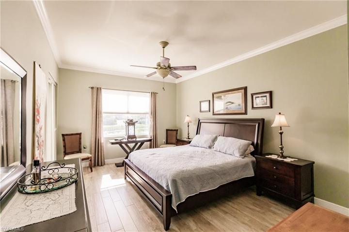 GREAT VIEW OF THE SIZE OF THE MASTER BEDROOM!  NOTE:THE SILHOUETTE & PRIVACY BLINDS ALONG WITH THE BEAUTIFUL FLOORING TO ENJOY!  NO CARPET!