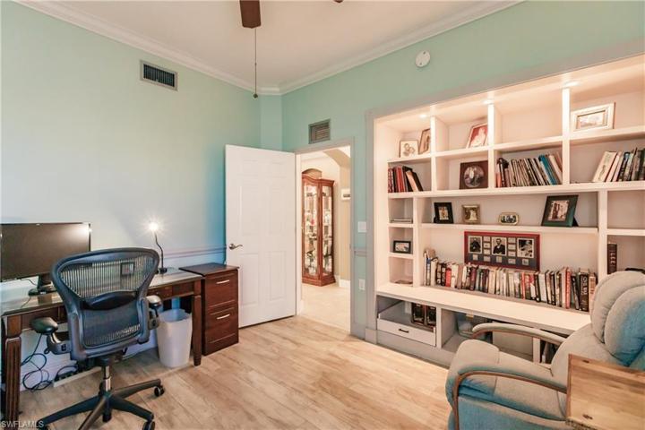 GUEST BEDROOM #2 IS CURRENTLY BEING USED AS AN OFFICE/DEN! THIS BEDROOM ALSO HAS THE NEW WOOD FLOORING & BEAUTIFUL AND VERY USEFUL BUILT IN CABINETS!
