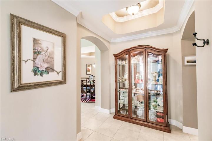 WCI BUILT WITH ATTENTION TO DETAIL LIKE COFFERED CEILINGS, CROWN MOLDING THROUGHOUT, UPDATED LIGHTING & BRIGHT COLORS! SIMPLY BEAUTIFUL!      MUST SEE IN PERSON TO APPRECIATE!