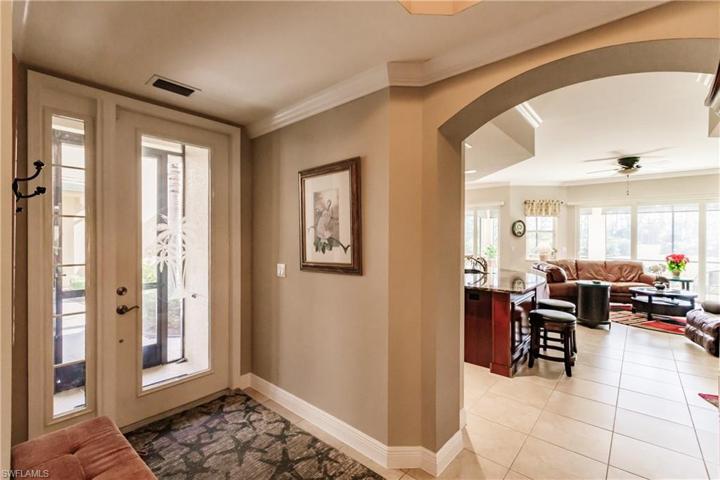 BEAUTIFUL ENTRYWAY WITH ETCHED GLASS DOOR LEADING INTO THIS AMAZING HOME!