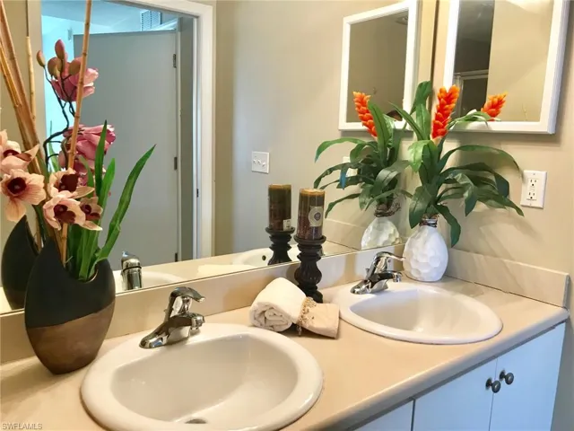 Full bathroom featuring double vanity