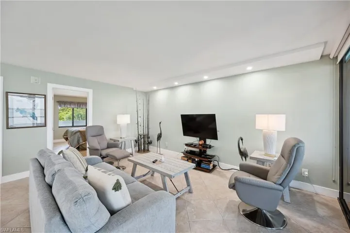 Living room with light tile floors