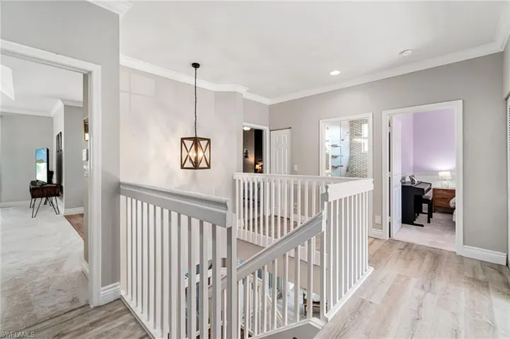 Upstairs landing is bright and open.