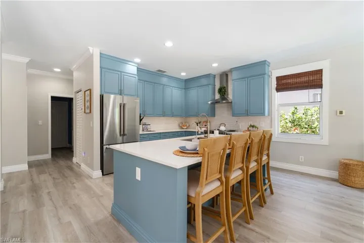 Bosch fridge at custom counter depth, and all new Frigidaire Professional appliances upgrade over builder basic.