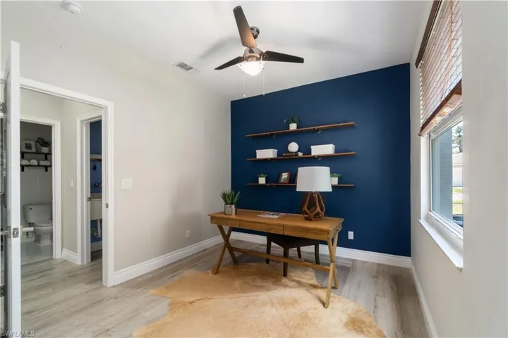 Downstairs 5th bedroom serves as an executive private office space.  Could be a perfect in-law suite with the adjacent bath location!