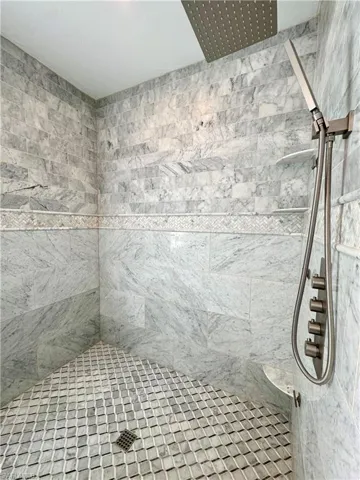 Bathroom with tiled shower