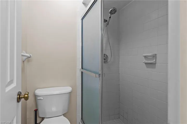 Bathroom with walk in shower and toilet