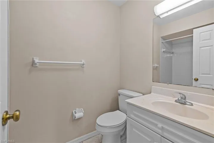 Bathroom with vanity and toilet