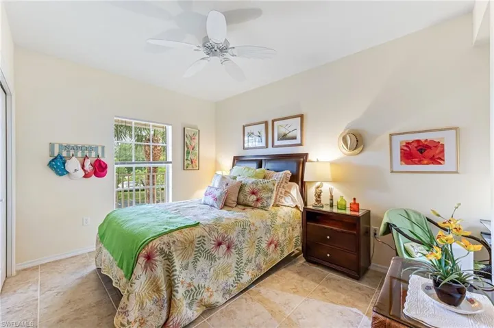 Bedroom featuring baseboards and a ceiling fan