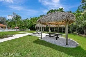 View of community featuring a gazebo and a yard