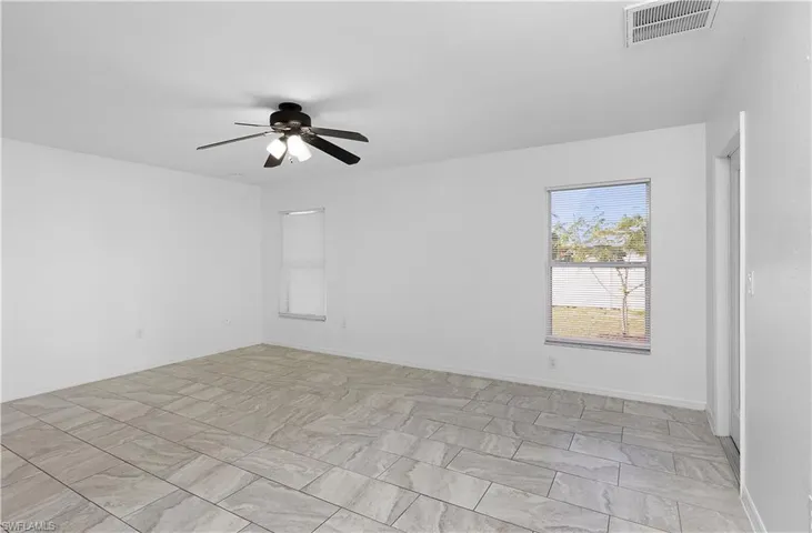 Unfurnished room with ceiling fan