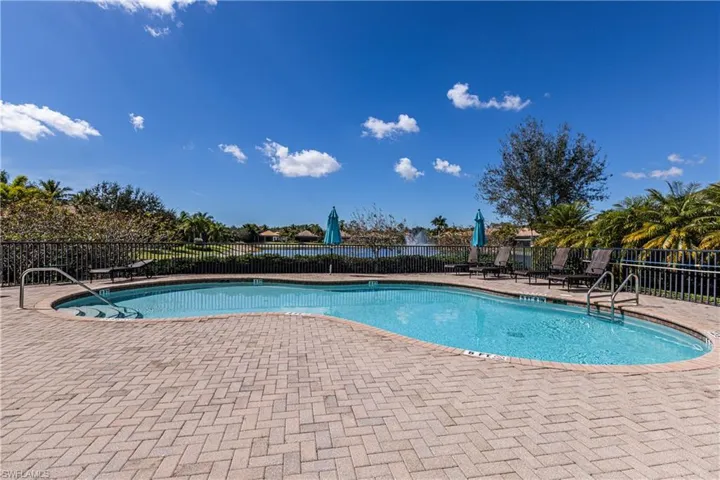 Community pool featuring a patio area