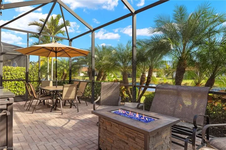 Relax on your extended noseeum screened lanai with dining area, lounge area, fire pit, tranquil lake views and upgraded landscaping.