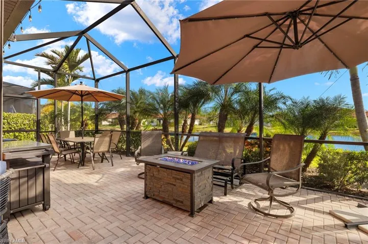 Relax on your extended noseeum screened lanai with dining area, lounge area, fire pit, tranquil lake views and upgraded landscaping.