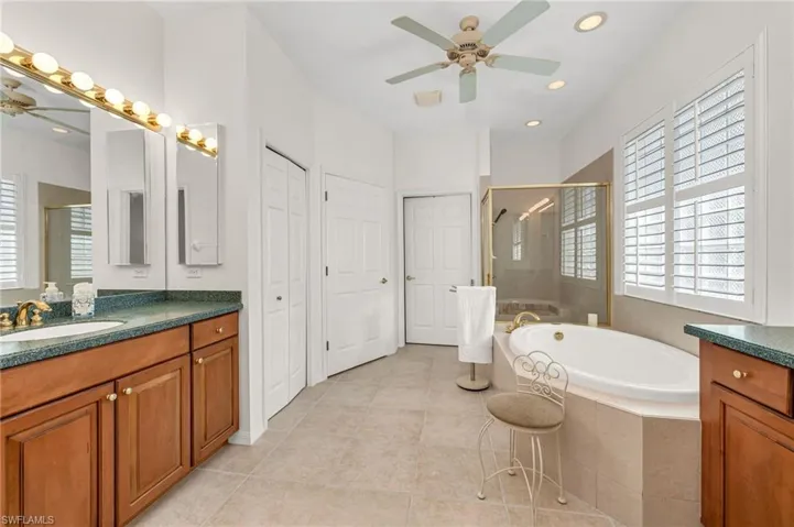 Primary bath with a soaking tub and a walk in shower.
