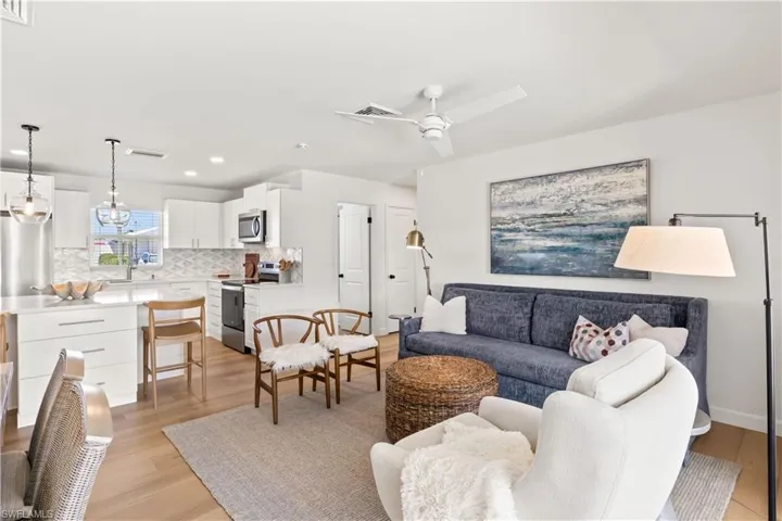 Dining, kitchen and living are all open to one another.