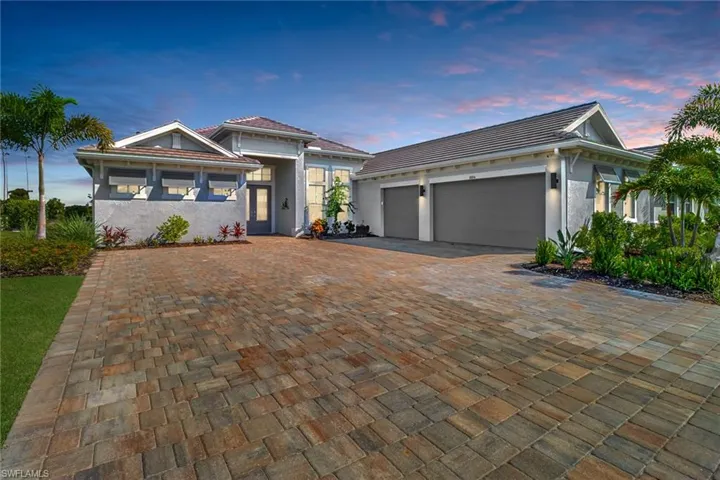 View of front of property with a garage
