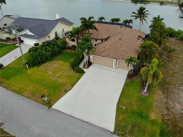 View of subject property with a large body of water