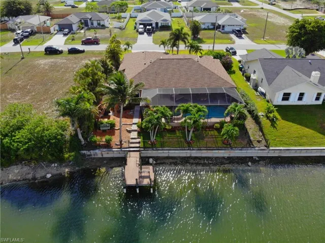 Aerial view of residential area with a nearby body of water
