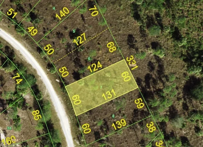 Aerial overview of property's location featuring property boundaries highlighted