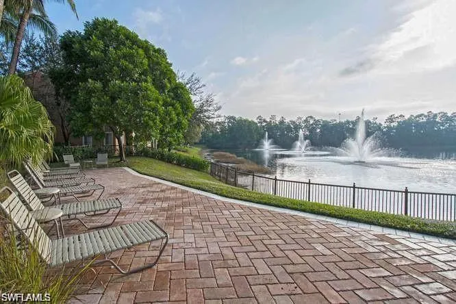 View of patio with a water view