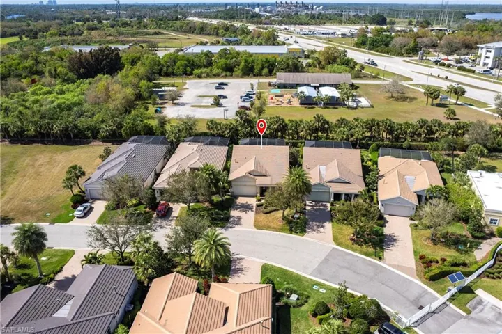 Birds eye view of property with a residential view