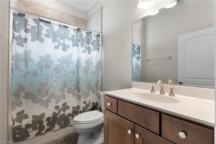 Bathroom with vanity and toilet