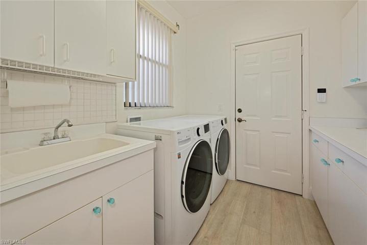 Laundry Room with Sink and lots of storage