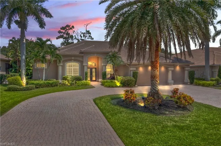 Mediterranean / spanish house with a lawn