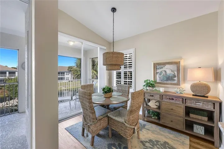Charming breakfast area overlooking lanai with water view