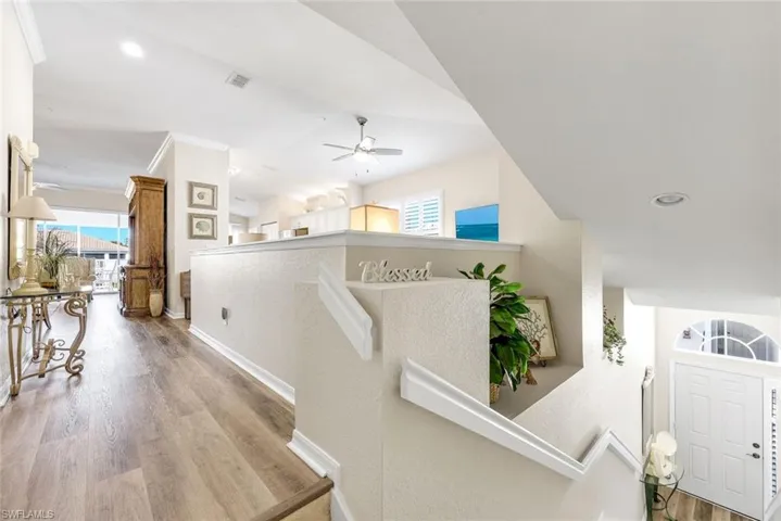 Landing-entrance to living room & den