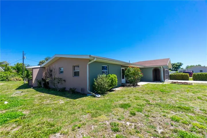 View of front of home with a front lawn