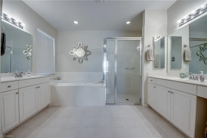Dual vanities, separate shower and tub