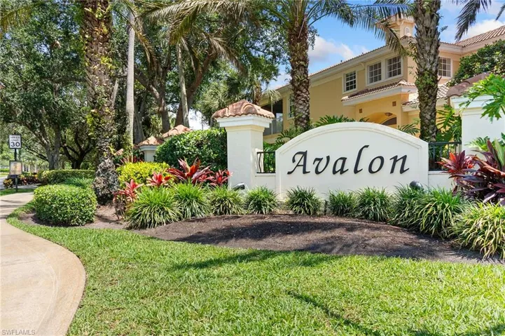 Community sign with a lawn
