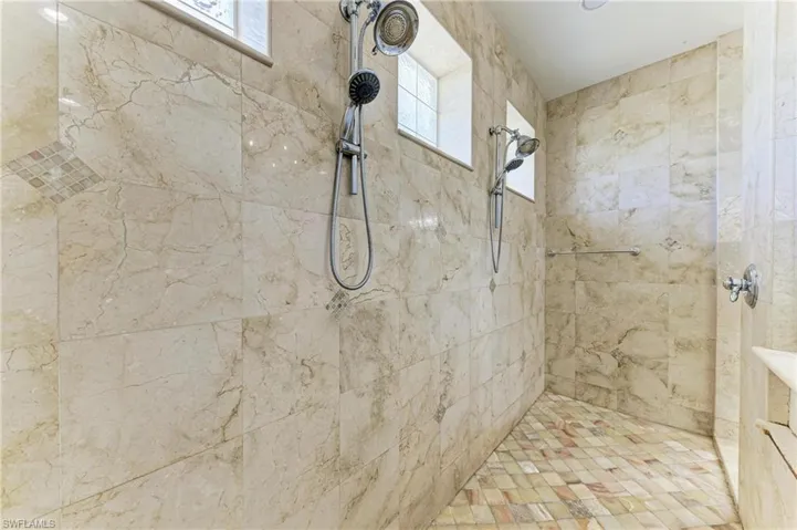 Full bath with tiled shower