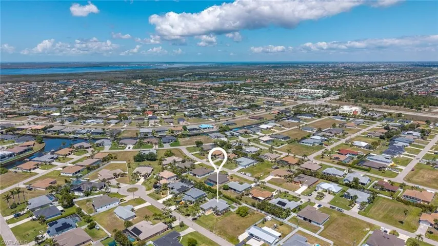 Bird's eye view with a residential view and a water view