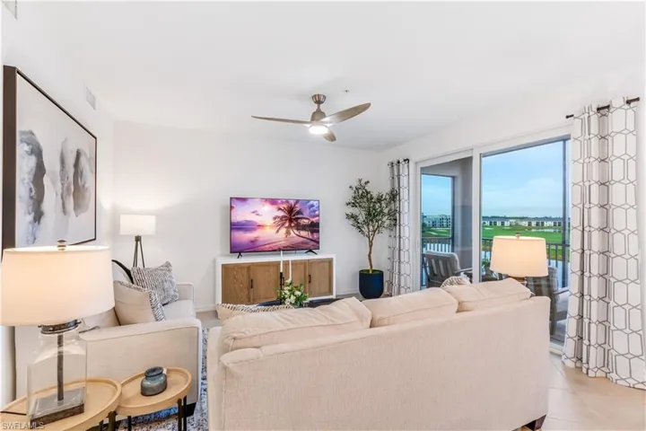 Tiled living room with ceiling fan